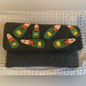 Champagne bottle beaded clutch
